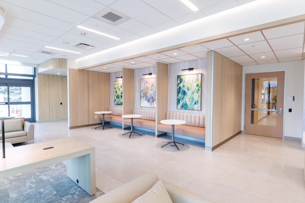 Indoor seating nooks with wood paneling at the Sun Family Campus